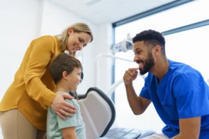 Young boy and his mother at a friendly dental check up