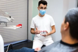 Dentist explaining a treatment plan to a patient